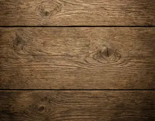 Horizontal oak planks with visible knots, dark seams and richly textured wood grain